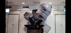 A picture of of me on the machine for my final session! Picture of me lying on the machine.